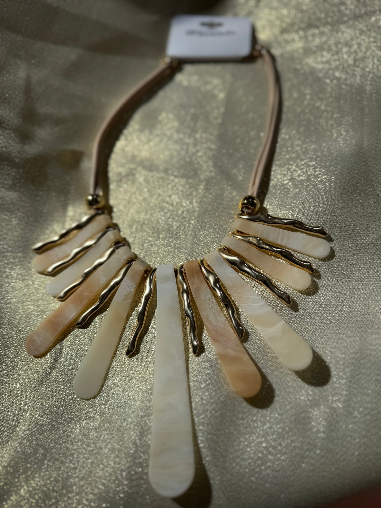 Stone and gold necklace