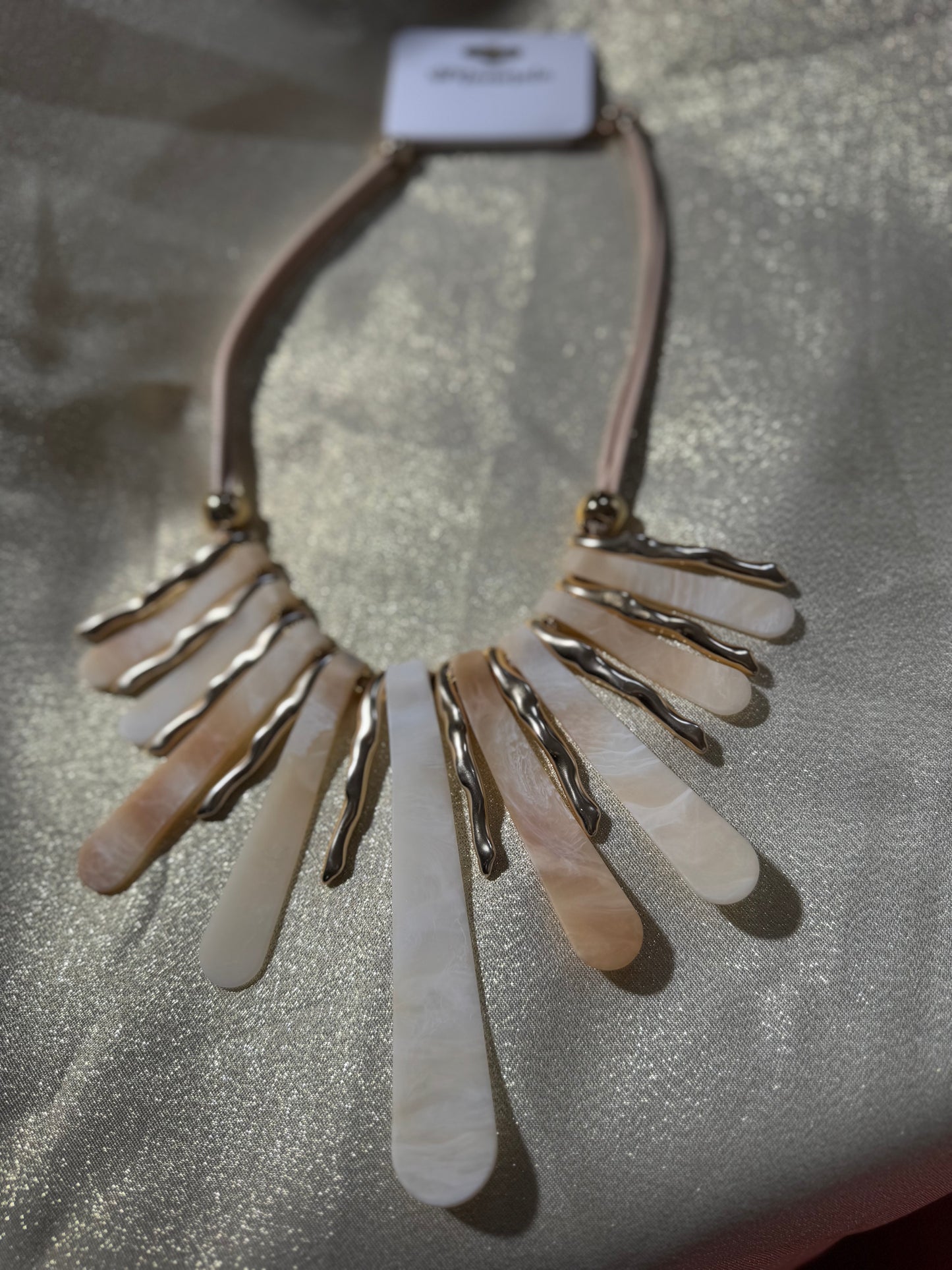 Stone and gold necklace