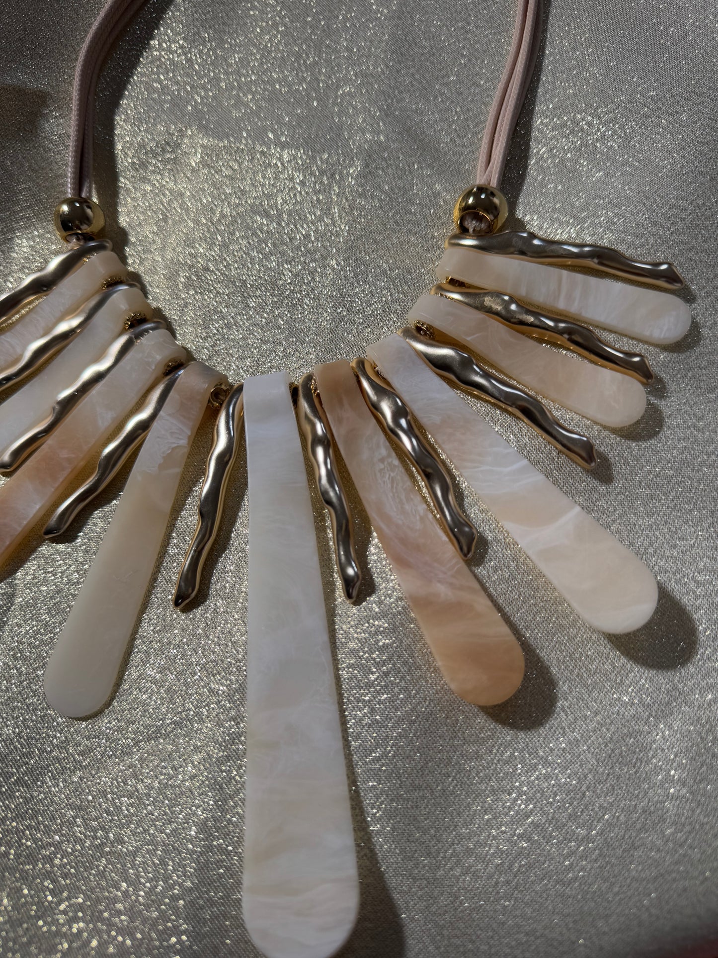 Stone and gold necklace